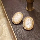 Antique Oval Stud Earrings In White