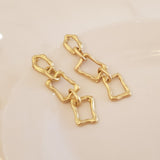 Gold Geometric Dangle Earrings