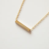 gold bar necklace by Adruzy