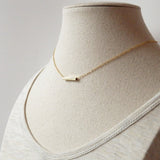 gold bar necklace by Adruzy