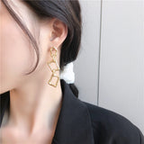 Gold Geometric Dangle Earrings